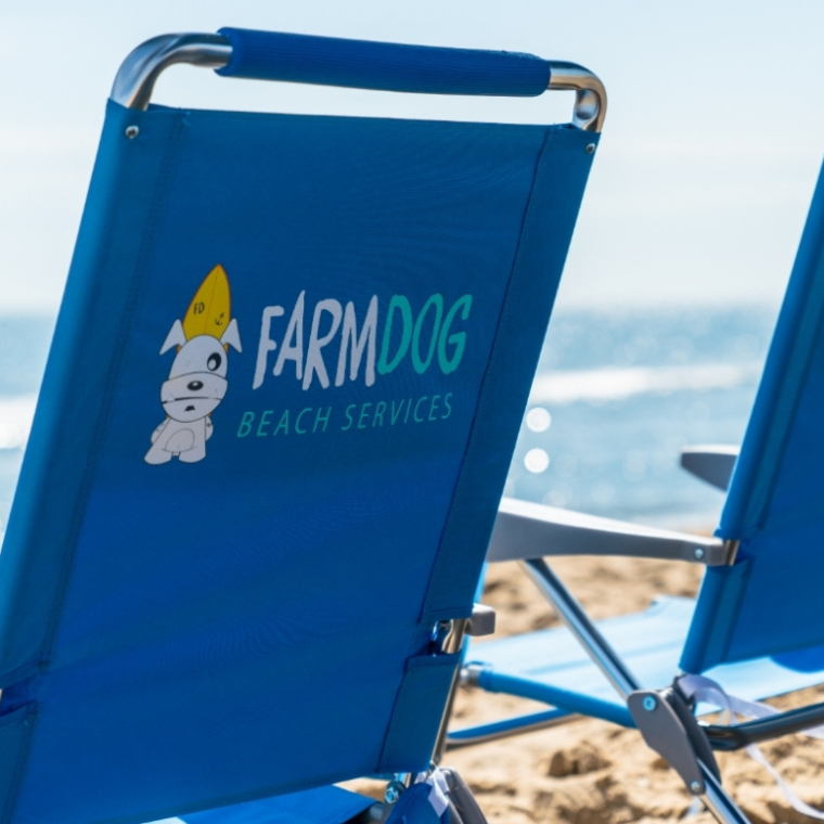 The back of beach lawn chairs from Farm Dog Beach Services.