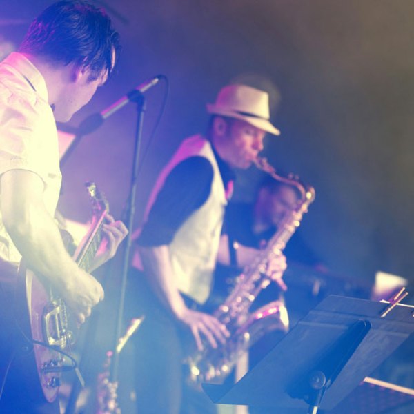 a group of people standing on a stage